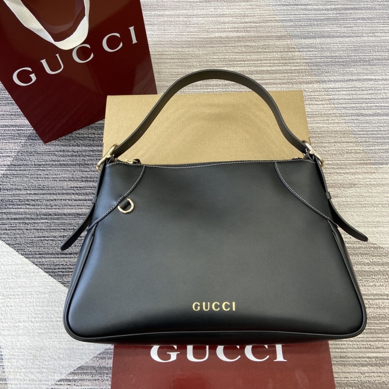 G*u*i top handle bags